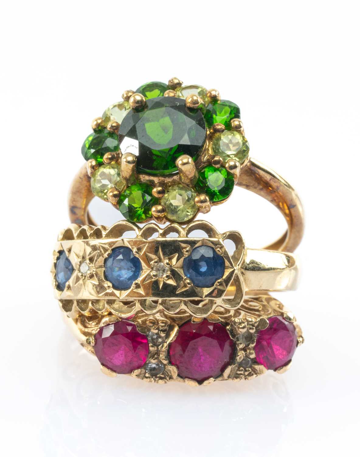 THREE GOLD RINGS comprising 9ct gold sapphire and diamond chip ring, 9ct gold ruby ring, 9ct gold