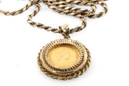 ELIZABETH II GOLD HALF SOVEREIGN, 1982, in 9ct gold pendant mount, on 9ct gold spiral link chain,