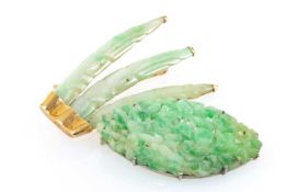 18K GOLD SET JADE FEATHER BROOCH, 5.3cms long, together with pierced jade floral brooch (2)