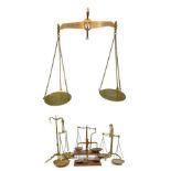 COLLECTION OF LARGE BRASS BALANCE SCALES including, large hanging Standard balance scales stamped '