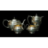 GEORGE VI SILVER FOUR PIECE TEASET, oval form, cream jug and sucrier with gilt interiors, Chester