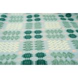 TRADITIONAL WELSH WOOLEN BLANKET of geometric design, pale blue ground with white, pink and green