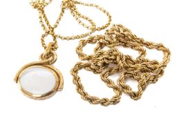 9CT GOLD REVOLVING FOB PENDANT on 9ct gold chain together with additional 9ct gold spiral chain,