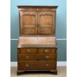 18TH CENTURY OAK BUREAU CABINET, cavetto cornice and marquetry frieze above shaped panel doors and