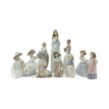 COLLECTION LLADRO/NAO FIGURINES including, Nightingale's Song 1345, Girl with Violin 1034, Kiss Me