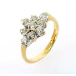 18CT GOLD DIAMOND CLUSTER RING, the nine round brilliant cut stones measuring 0.05cts each