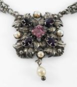 CONTINENTAL SILVER SPINEL, AMETHYST & PEARL NECKLACE, c.1900, naturalistic leaf centrepiece set with