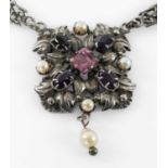 CONTINENTAL SILVER SPINEL, AMETHYST & PEARL NECKLACE, c.1900, naturalistic leaf centrepiece set with