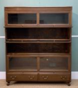 EARLY 20TH C. STAINED OAK WERNICKE STYLE BOOKCASE, four shelves with up-and-over glazed doors over