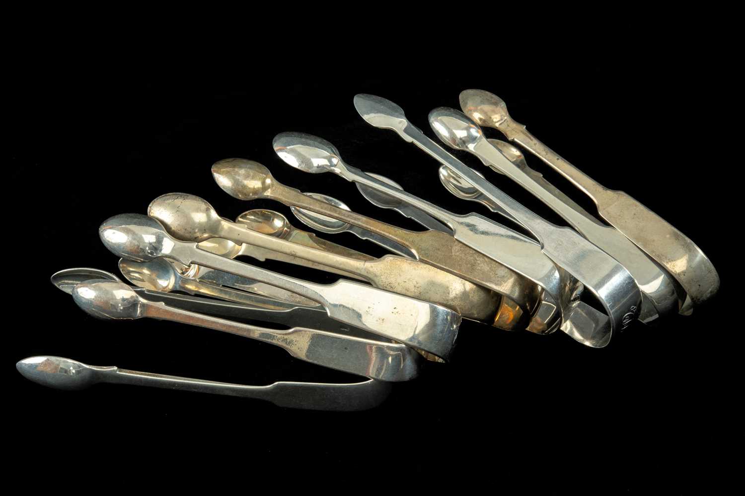 EIGHT 19TH C. SILVER FIDDLE PATTERN SUGAR NIPS/TONGS, various makers & dates, including three with - Image 2 of 2