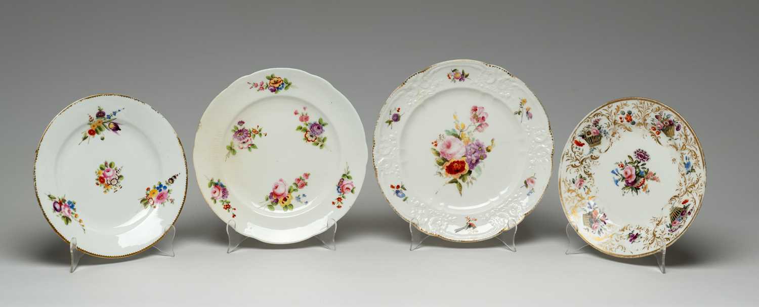 FOUR NANTGARW PLATES circa 1815-1820, comprising 'Tumbling Baskets' dessert plate, 21.4cms (diam),