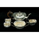 LATE VICTORIAN SILVER THREE PIECE TEASET, comprising teapot, cream jug and sucrier, Birmingham 1900,