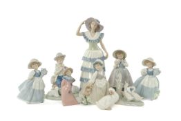 ASSORTED NAO PORCELAIN FIGURES including, children with farm animals, water pail, flower bouquet