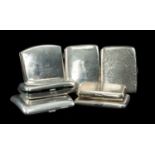 SEVEN SILVER CIGARETTE CASES, late 19th/early 20th C. four with floral or machined decoration,