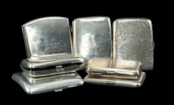 SEVEN SILVER CIGARETTE CASES, late 19th/early 20th C. four with floral or machined decoration,