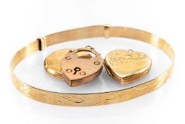 9CT GOLD JEWELLERY comprising engraved bangle, 2 x lockets and a heart padlock, 18.3gms gross (4)
