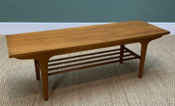 MID-CENTURY TEAK COFFEE TABLE, slightly tapered at each end in 'surfboard' form, with magazine