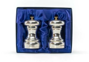 BOXED PAIR SILVER SALT & PEPPER MILLS, R.J. Carr, Sheffield 2001, 10cms (h) (2) Provenance: