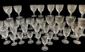 SUITE OF 'GOTHIC' PATTERN WEBB AND CORBETT CUT GLASS, 12 water goblets, 10 wine glasses, 12