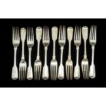 ELEVEN 19TH C. SILVER FIDDLE PATTERN TABLE FORKS, George Adams, London 1847, set of eight, and