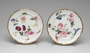 PAIR OF NANTGARW PORCELAIN DESSERT PLATES circa 1813-1820, each painted with full blown roses and