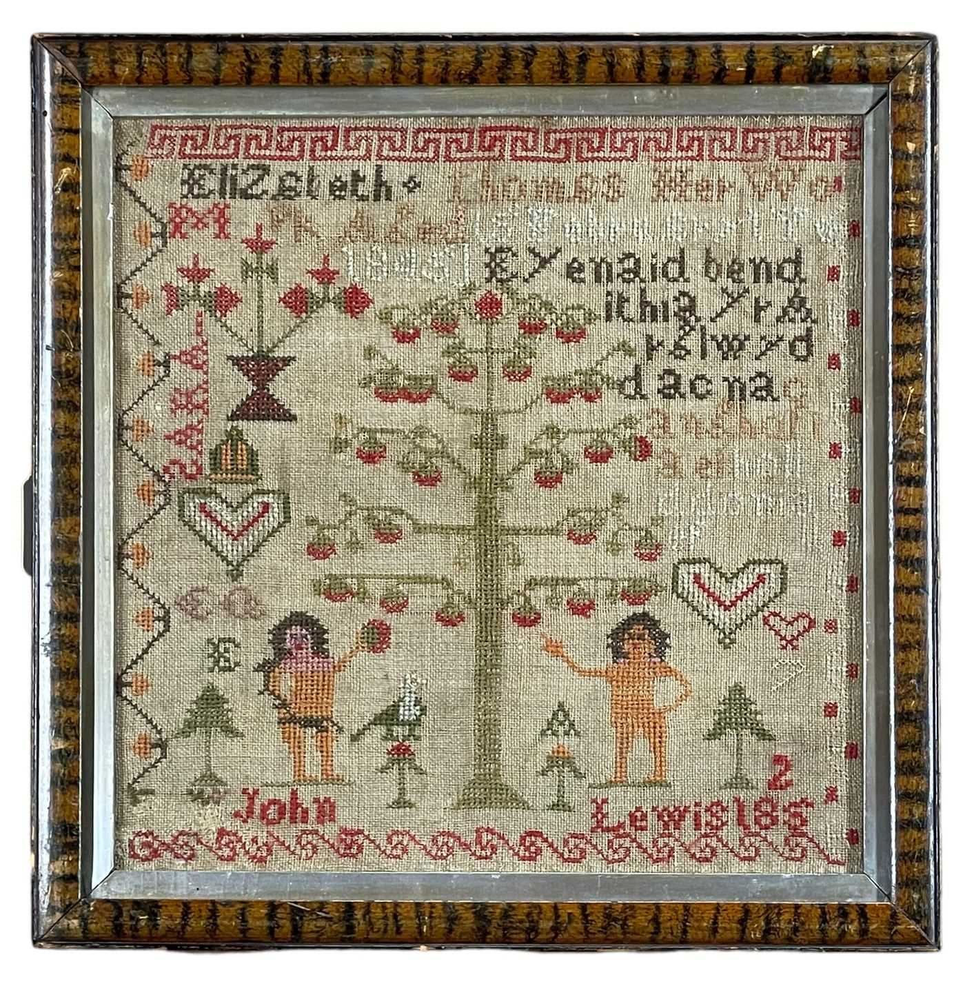 WELSH & ENGLISH LANGUAGE WOOLWORK SAMPLER showing Adam and Eve flanking the apple tree, above ' - Image 2 of 2