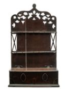 GEORGE III WELSH OAK MURAL SPOON RACK, pierced tall two-piece back applied with two lateral rails