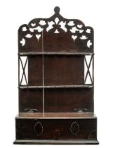 GEORGE III WELSH OAK MURAL SPOON RACK, pierced tall two-piece back applied with two lateral rails