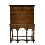 WELSH OAK INLAID CHEST ON STAND early 18th Century and later, Glamorgan, with double plank top