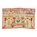 ‡ WELSH EMBROIDERED SAMPLER circa 1890s, alphabetical, numerical and pictorial, worked by Mona