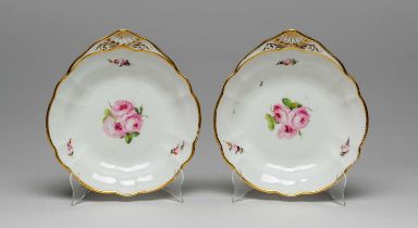 PAIR OF NANTGARW PORCELAIN FAN-HANDLED DESSERT DISHES circa 1813-1820, centres painted with sprays
