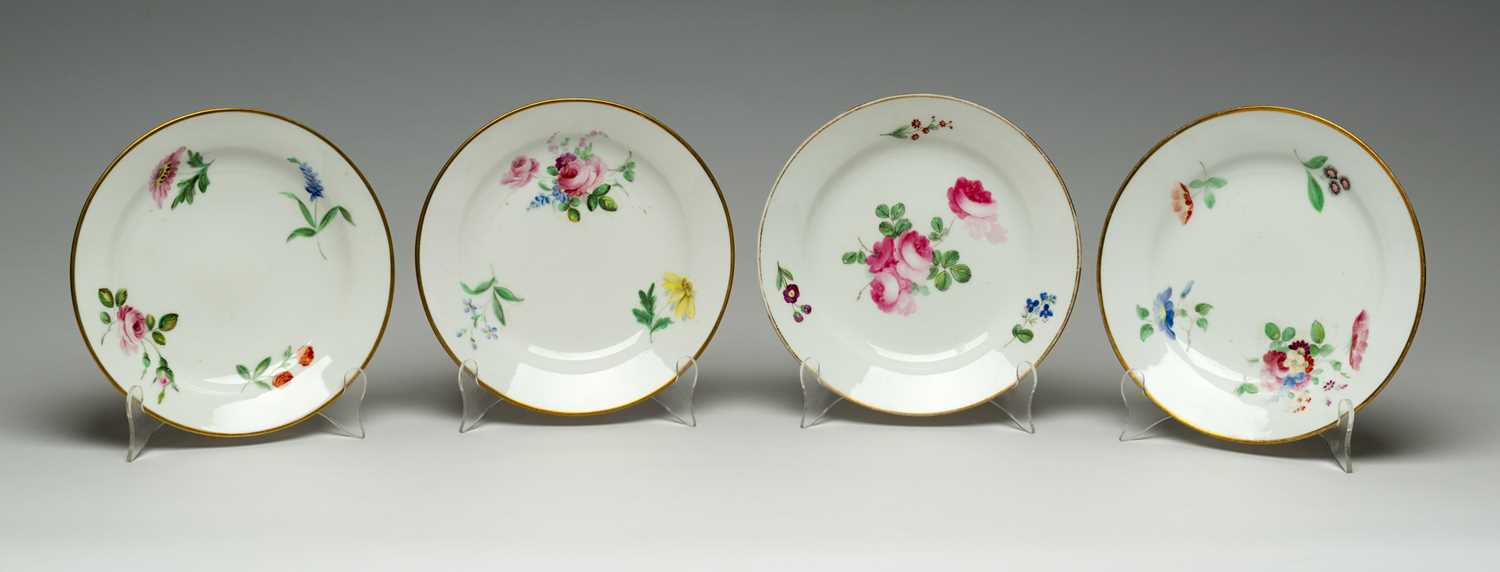 SET OF FOUR SWANSEA PORCELAIN DESSERT PLATES circa 1818-1820, in the Trident paste, each painted