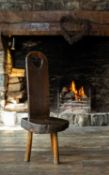 RARE PRIMITIVE WELSH OAK, ELM & ASH BACKSTOOL late 18th Century, the single arch-shaped back board