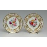 PAIR OF MATCHING NANTGARW PORCELAIN PLATES circa 1817-1820, with large central floral spray to the