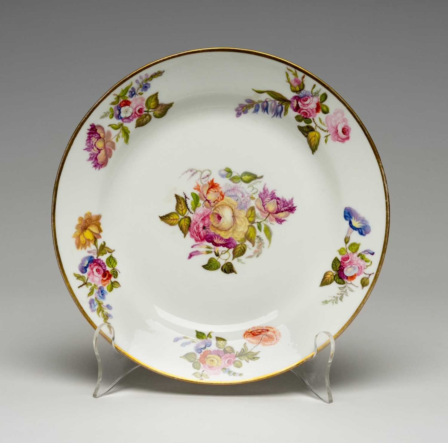 SWANSEA PORCELAIN PLATE circa 1815-17, painted by Henry Morris with tight sprays of summer flowers