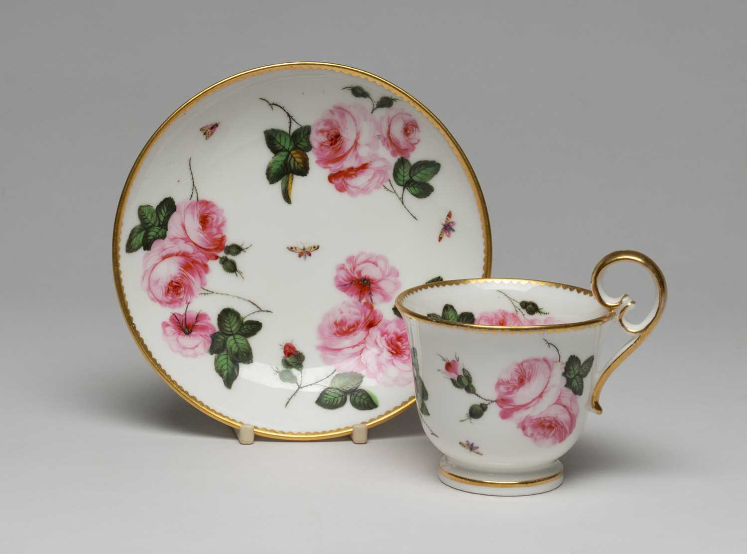NANTGARW COFFEE CUP & SAUCER circa 1815-1818, painted finely with full blown roses and small