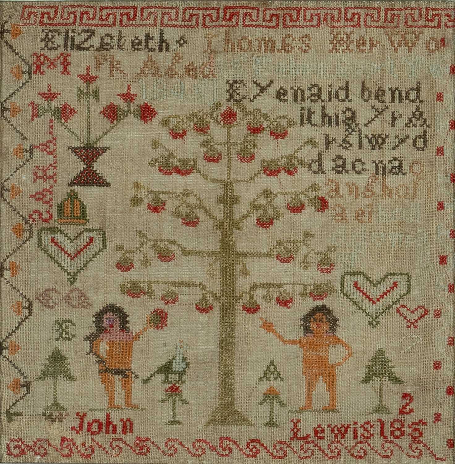 WELSH & ENGLISH LANGUAGE WOOLWORK SAMPLER showing Adam and Eve flanking the apple tree, above '