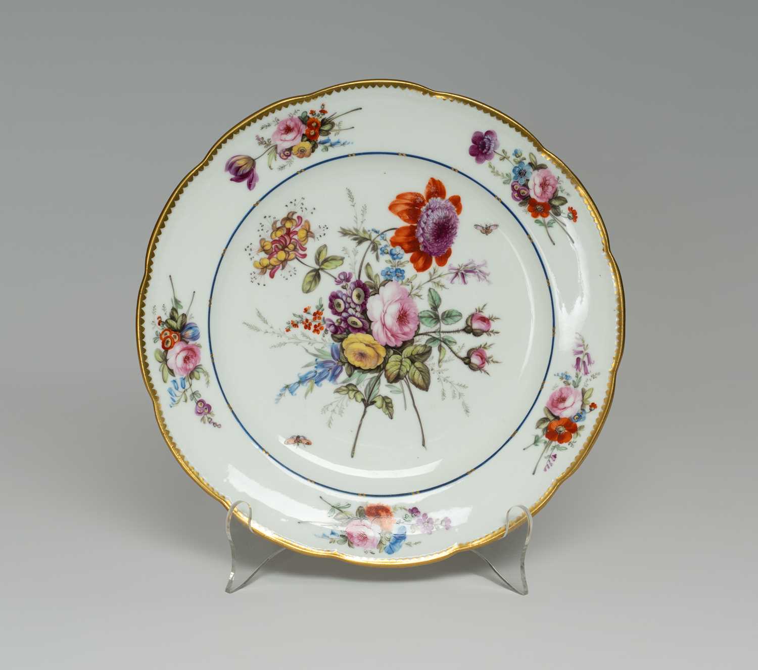 NANTGARW PORCELAIN PLATE circa 1817-1820. non-moulded border, decorated with large full floral spray