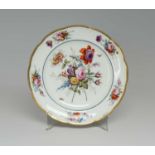 NANTGARW PORCELAIN PLATE circa 1817-1820. non-moulded border, decorated with large full floral spray