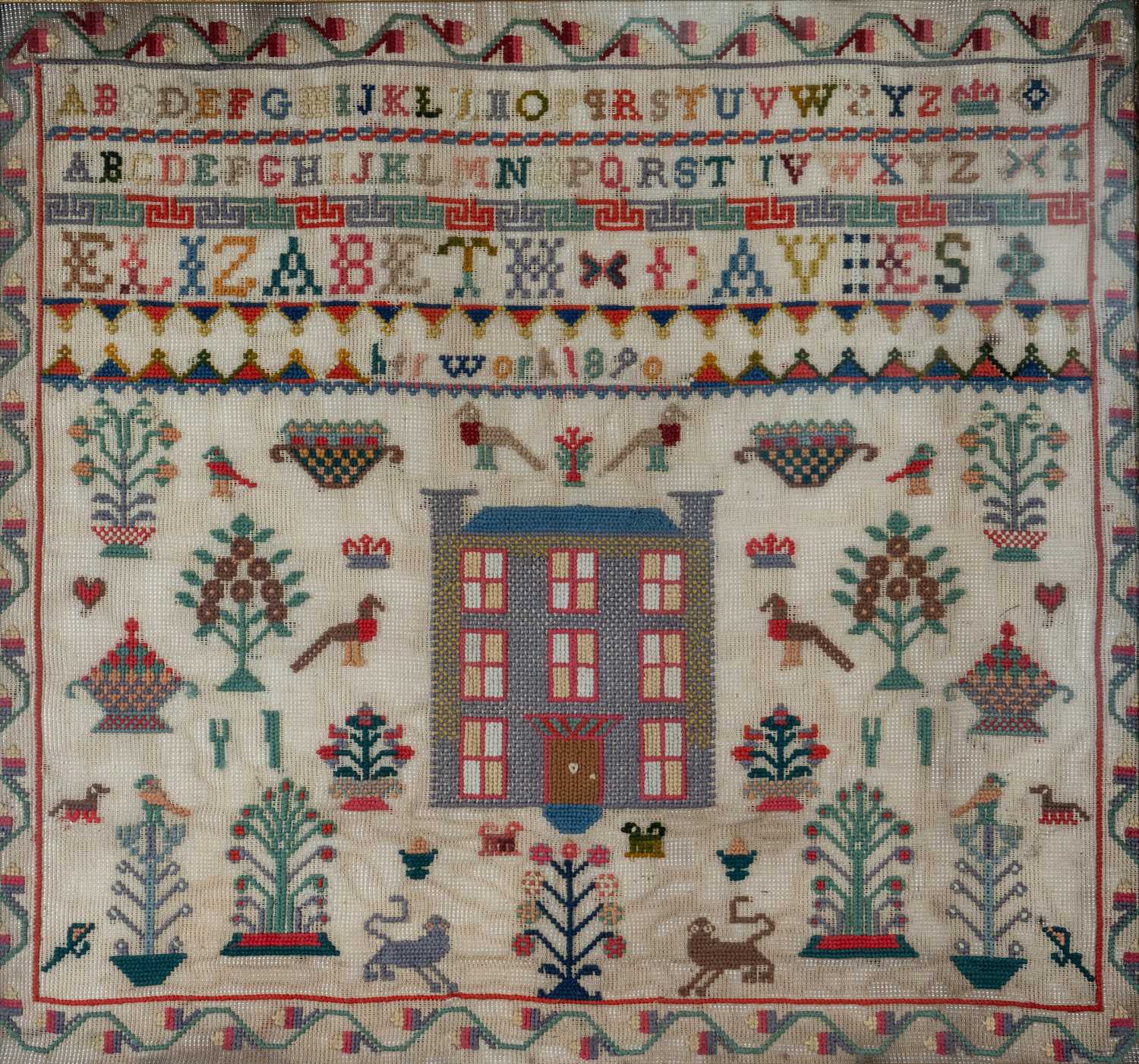 VICTORIAN WOOLWORK SAMPLER, dated 1890, very well and profusely worked in different colours by