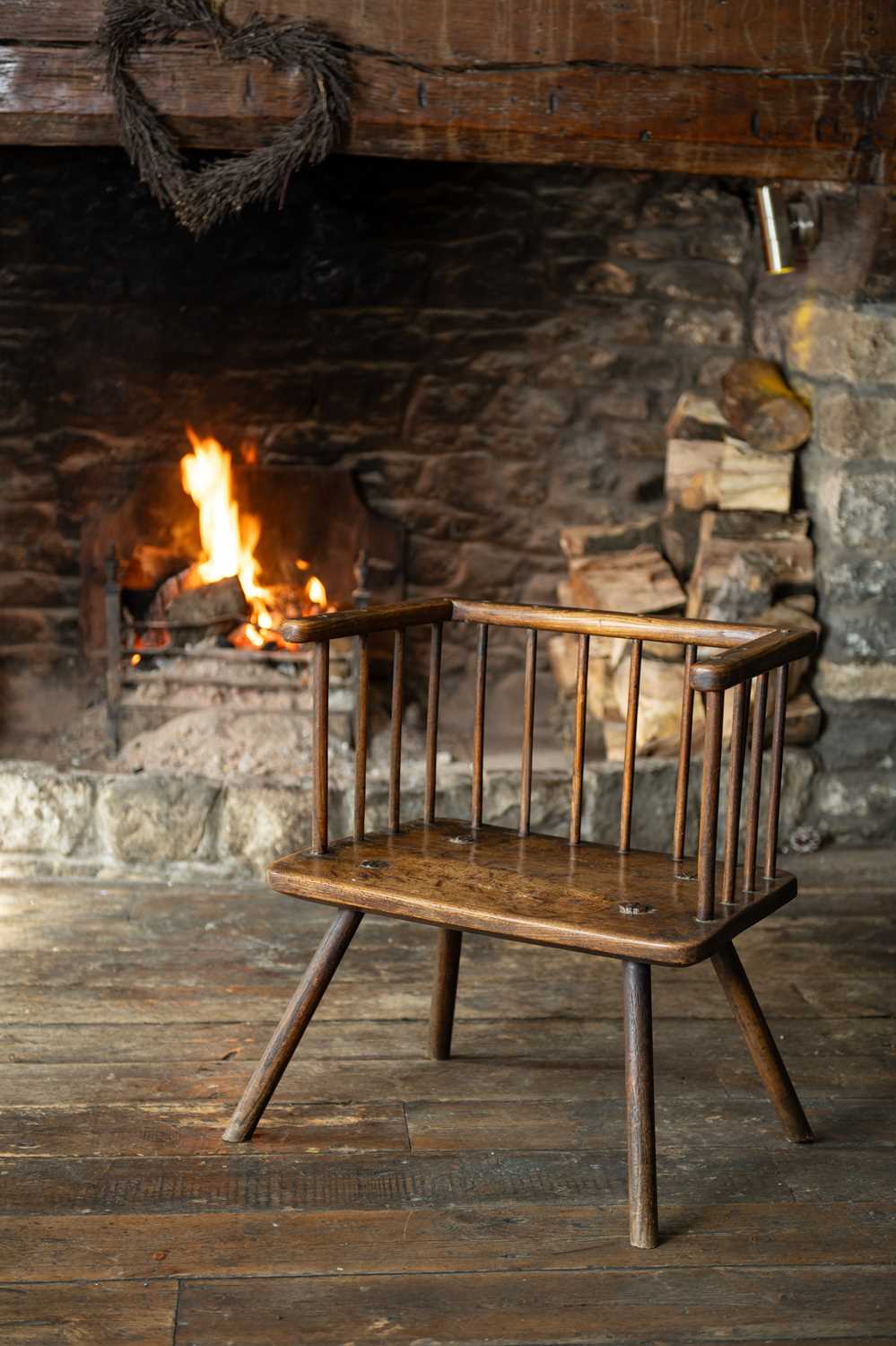 BELIEVED WELSH ELM & ASH ARMCHAIR late 18th Century, fourteen spindles below square shaped joined