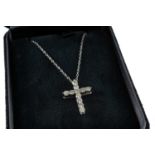 TIFFANY & CO PLATINUM DIAMOND CROSS PENDANT, set with eleven round brilliant cut diamonds, on