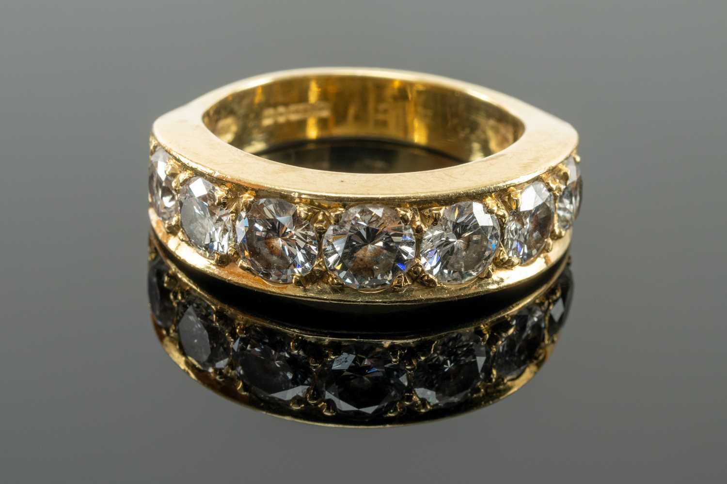 SEVEN STONE DIAMOND & 18CT GOLD HALF HOOP RING, the modern brilliant cut diamonds about 0.35ct