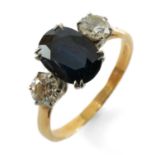 18CT GOLD SAPPHIRE & DIAMOND THREE STONE RING, the central oval cut sapphire measuring 2.1cts