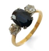 18CT GOLD SAPPHIRE & DIAMOND THREE STONE RING, the central oval cut sapphire measuring 2.1cts