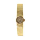 18K GOLD PATEK PHILIPPE FOR TIFFANY & CO. LADIES' BRACELET WATCH, the signed small circular dial