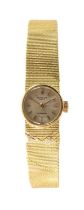 18K GOLD PATEK PHILIPPE FOR TIFFANY & CO. LADIES' BRACELET WATCH, the signed small circular dial