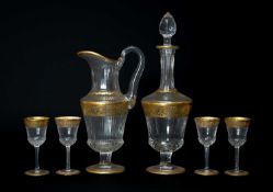 SUITE OF SAINT-LOUIS 'THISTLE GOLD' PATTERN CRYSTAL, comprising decanter and stopper 39cms (h), four