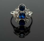 WHITE METAL SAPPHIRE & DIAMOND CLUSTER RING, the three vertical sapphires complimented by six old