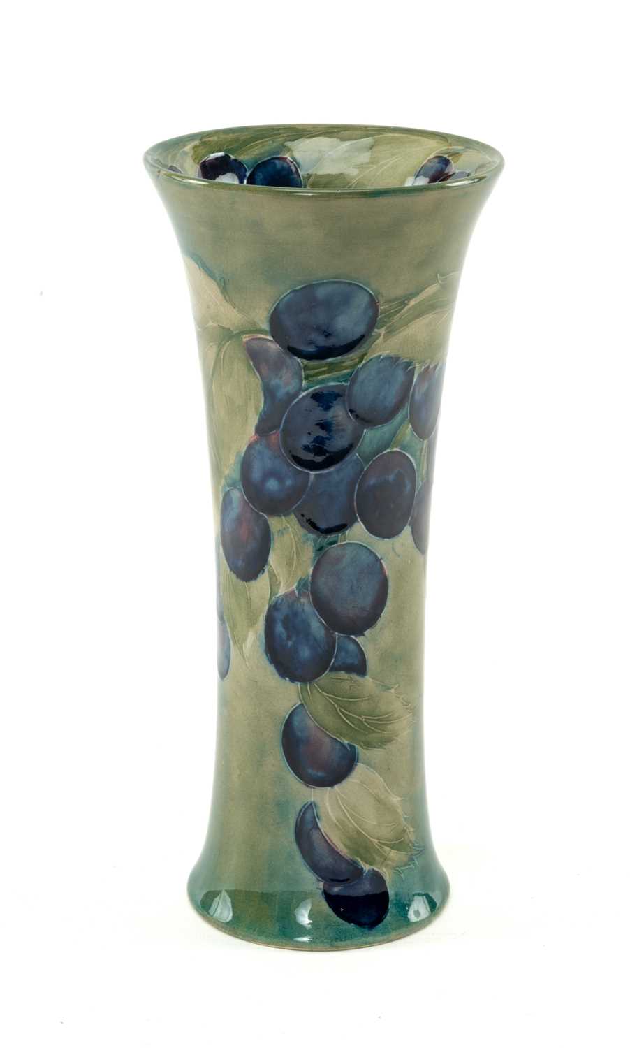 RARE WILLIAM MOORCROFT 'DAMSON' PATTERN VASE, c.1915, of waisted trumpet form, painted to the